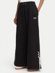 Reebok Spodnie dresowe Dominka RK25696CCW Czarny Regular Fit. Czarne spodnie dresowe damskie Reebok, bez wzorów, z bawełny. Za 279.99 zł.
