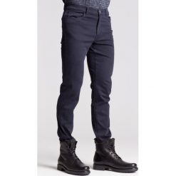 Granatowe jeansy męskie Regular fit - Granatowy. Niebieskie jeansy męskie TRUSSARDI JEANS, z jeansu. Za 200.00 zł.