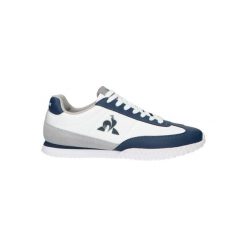 Tenisówki Le Coq Sportif Model Veloce Kolor Biały. Niebieskie trampki i tenisówki damskie le coq sportif, bez wzorów, ze skóry, bez zapięcia. Za 323.25 zł.