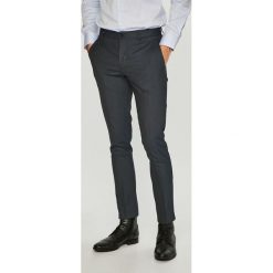 Jack & Jones - Spodnie. Niebieskie eleganckie spodnie męskie Jack & Jones, bez wzorów, z elastanu, eleganckie. W wyprzedaży za 139.90 zł.