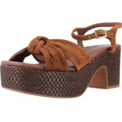 Sandały UNISA KALEA KS Brązowy. Brązowe sandały damskie Unisa, bez wzorów, ze skóry, bez obcasa, bez zapięcia. Za 423.99 zł.