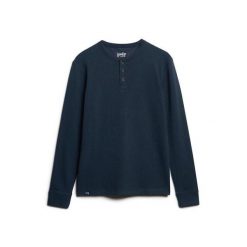 Bluza z tunezyjskim kołnierzem Superdry The Merchant Store. Niebieskie bluzy męskie Superdry, m, bez wzorów, bez ramiączek, bez kaptura. W wyprzedaży za 214.00 zł.