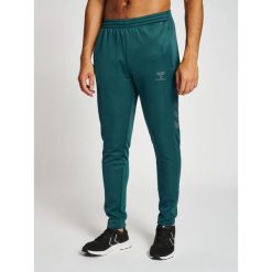 Spodnie dresowe polyesterowe Hummel Core XK. Zielone spodnie sportowe męskie Hummel, m, bez wzorów, z dresówki, na fitness i siłownię. Za 203.50 zł.