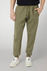 GUESS Zielone męskie spodnie dresowe z lampasami Mickey. Zielone spodnie sportowe męskie Guess, l, z aplikacjami, z bawełny. W wyprzedaży za 355.99 zł.