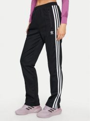 Adidas Spodnie dresowe Beckenbauer IW3171 Czarny Regular Fit. Czarne spodnie dresowe damskie Adidas, bez wzorów, z bawełny. Za 199.99 zł.