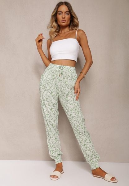Jasnozielone Wiskozowe Spodnie w Kwiaty z Gumką w Pasie Rivabele. Zielone spodnie materiałowe damskie Renee, bez wzorów, z jeansu, eleganckie. Za 29.99 zł.