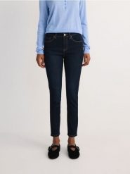 Jeansy slim push up - granatowy. Niebieskie jeansy damskie Reserved, bez wzorów, z denimu. W wyprzedaży za 49.99 zł.