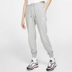Nike Szary/Srebrny L. Szare spodnie dresowe damskie Nike, bez wzorów, sportowe. Za 128.69 zł.