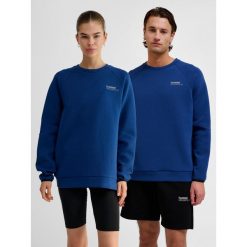 Bluza Hummel Tech. Niebieskie bluzy damskie Hummel, na zimę, bez wzorów, z bawełny, klasyczne, bez ramiączek, bez kaptura. Za 294.50 zł.