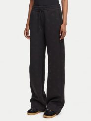 Guess Spodnie dresowe V6YB10 K4295 Czarny Regular Fit. Czarne spodnie dresowe damskie Guess, z aplikacjami, z dresówki. Za 344.99 zł.