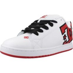 Kapcie DC COURT GRAFFIK M Biały. Białe buty zimowe męskie DC Shoes, bez wzorów, ze skóry, bez obcasa, bez zapięcia. Za 370.99 zł.