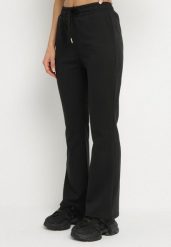 Czarne Spodnie Dresowe o Kroju Dzwonów z Gumką w Talii Efravella. Czarne spodnie dresowe damskie Born2be, bez wzorów, z dresówki, eleganckie. Za 34.99 zł.