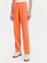 Adidas Spodnie dresowe adicolor Classics Firebird JC8286 Pomarańczowy Regular Fit. Brązowe spodnie dresowe damskie Adidas, bez wzorów, z dresówki. Za 179.99 zł.