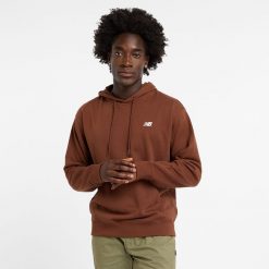 Bluza męska New Balance MT41508ROK – brązowa. Brązowe bluzy męskie New Balance, m, z aplikacjami, z bawełny, bez kaptura. Za 169.99 zł.
