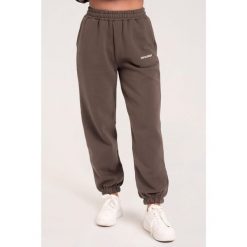 Spodnie fitness damskie Gym Glamour dresowe. Brązowe spodnie dresowe damskie GYM GLAMOUR, bez wzorów, z dresówki, glamour. Za 189.99 zł.