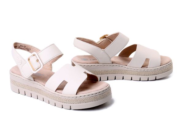 RIEKER V4952-60 beige, sandały damskie. Brązowe sandały damskie Rieker, bez wzorów, bez obcasa, bez zapięcia. Za 223.93 zł.