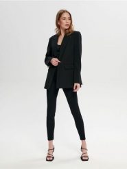 Jeansy skinny mid waist - czarny. Czarne jeansy damskie Sinsay, bez wzorów, z jeansu. Za 39.99 zł.