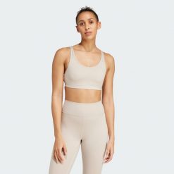 Biustonosz All Me Essentials Medium-Support. Czarne bielizna sportowa damska Adidas, xs, bez wzorów, z materiału. Za 170.20 zł.
