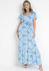 Niebieska Rozkloszowana Sukienka Maxi z Wiązanym Paskiem Aziza. Niebieskie sukienki damskie Born2be, m, bez wzorów, z bawełny, bez kołnierzyka, bez ramiączek, maxi, kopertowe. Za 84.99 zł.