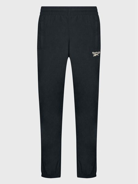 Reebok Spodnie dresowe Vector HK7077 Czarny Slim Fit. Czarne spodnie sportowe męskie Reebok, m, bez wzorów, z dresówki. Za 229.99 zł.