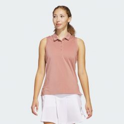 Koszulka Women's Ultimate365 Solid Sleeveless Polo. Czerwone bluzki damskie Adidas, m, bez wzorów, z materiału, sportowe, bez kołnierzyka, bez ramiączek. Za 162.80 zł.