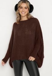 Brązowy Luźny Sweter w Stylu Ponczo Kossela. Brązowe swetry nierozpinane damskie Born2be, bez wzorów, z jeansu, wizytowe, bez kołnierzyka, bez ramiączek. Za 84.99 zł.