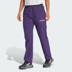Spodnie Terrex Multi Liteflex. Fioletowe spodnie sportowe damskie Adidas, na lato, bez wzorów, z materiału, sportowe, trekkingowe. W wyprzedaży za 239.85 zł.