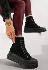 Czarne Botki Peralle. Czarne botki damskie Born2be, bez wzorów, z gumy, rockowe, za kostkę, bez obcasa, na płaskiej podeszwie, bez zapięcia. Za 89.99 zł.