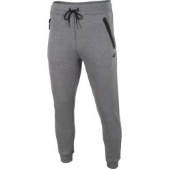 Spodnie dresowe męskie SPMD004 - średni szary melanż. Szare spodnie sportowe męskie 4F, m, bez wzorów, z dresówki. W wyprzedaży za 119.99 zł.