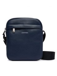 Calvin Klein Saszetka Raised Reporter LV04D3160G Granatowy. Niebieskie saszetki i nerki męskie Calvin Klein, bez wzorów, ze skóry. Za 329.99 zł.