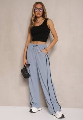 Niebieskie Szerokie Spodnie Dresowe High Waist Zdobione Lampasami Sopaline. Niebieskie spodnie dresowe damskie Renee, z aplikacjami, z dresówki, eleganckie. Za 49.99 zł.