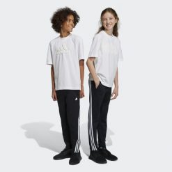 Future Icons 3-Stripes Ankle-Length Pants. Białe spodnie dresowe damskie Adidas, bez wzorów, z dresówki, na jogę i pilates. Za 149.99 zł.