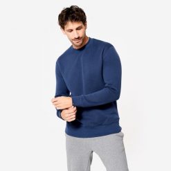 Bluza męska Domyos Gym & Pilates. Czarne bluzy męskie DOMYOS, na lato, l, bez wzorów, z bawełny, sportowe, bez ramiączek, bez kaptura. Za 69.99 zł.