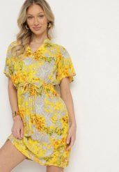 Żółta Sukienka w Kwiaty z Paskiem Cleza. Żółte sukienki damskie Born2be, na co dzień, na lato, l, bez wzorów, eleganckie, bez kołnierzyka, bez ramiączek, midi. Za 44.99 zł.