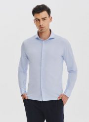 PAKO LORENTE – Jasnoniebieska koszula z dzianiny. Koszule męskie Pako Lorente, m, bez wzorów, z bawełny, bez kołnierzyka, bez ramiączek. Za 199.99 zł.