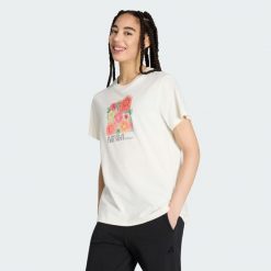 Luźna Koszulka Z Kwiatową Grafiką 2. Białe bluzki damskie Adidas, bez wzorów, bez kołnierzyka, bez ramiączek. Za 149.00 zł.