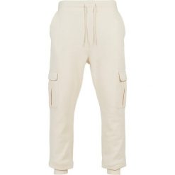 Spodnie Cargo Urban Classics. Białe spodnie materiałowe męskie Urban Classics, bez wzorów. Za 244.50 zł.