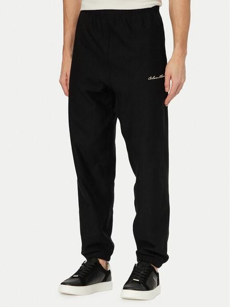 Calvin Klein Jeans Spodnie dresowe LV04RF249G Czarny Regular Fit. Czarne szorty męskie Calvin Klein Jeans, bez wzorów, z bawełny. Za 293.99 zł.