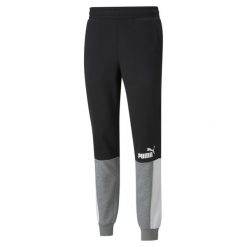 Męskie spodnie dresowe z blokami kolorów Essentials Camo PUMA Black. Czarne spodnie sportowe męskie Puma, m, bez wzorów, z dresówki, na fitness i siłownię. Za 262.00 zł.