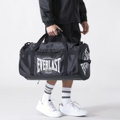 ICONIC WIELKA TORBA SPORTOWA CZARNY POLIESTER. Czarne torby sportowe męskie EVERLAST, bez wzorów, z poliesteru, duże. Za 257.30 zł.