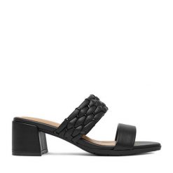 Klapki JENNY. Czarne klapki damskie Jenny, bez wzorów, bez obcasa, bez zapięcia. Za 129.99 zł.