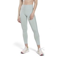 Damskie legginsy z wysokim stanem w prążki Reebok. Niebieskie legginsy damskie Reebok, bez wzorów, z dzianiny. Za 263.60 zł.