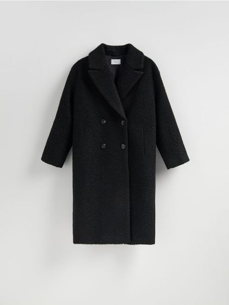 Dwurzędowy płaszcz oversize - czarny. Czarne płaszcze damskie Reserved, l, bez wzorów, z tkaniny, bez kołnierzyka, bez kaptura. Za 279.99 zł.