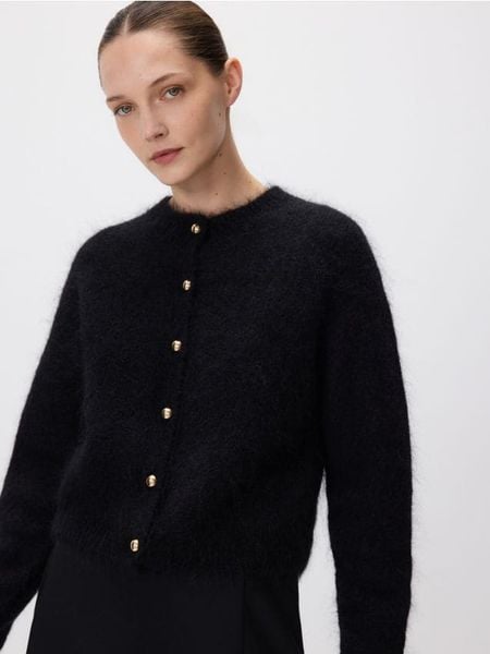 Kardigan z moherem - czarny. Czarne kardigany damskie Reserved, l, bez wzorów, z dzianiny, bez kołnierzyka. Za 299.99 zł.