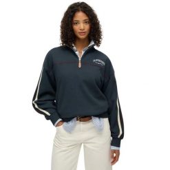 Sweter z kołnierzem tunezyjskim damski Superdry Country Club Tape. Niebieskie swetry nierozpinane damskie Superdry, na zimę, bez wzorów, bez kołnierzyka, bez ramiączek. Za 343.00 zł.