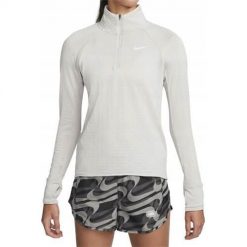 Bluza treningowa damska Nike Therma-FIT. Brązowe bluzy damskie Nike, bez wzorów, sportowe, bez ramiączek, bez kaptura. Za 271.00 zł.
