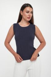 Top damski dzianinowy Valido MM. Topy damskie MM, l, bez wzorów, z dzianiny, bez kołnierzyka, bez ramiączek. W wyprzedaży za 389.40 zł.