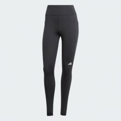 Legginsy Own the Run Winter Full Length. Czarne legginsy damskie Adidas, bez wzorów, z elastanu. Za 248.00 zł.