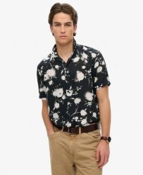Superdry Koszula krótkie rękawy z nadrukiem w modal – Abstract Floral Mono. Koszule damskie Superdry, xl, bez wzorów, z materiału, klasyczne, bez kołnierzyka, bez ramiączek. Za 265.35 zł.