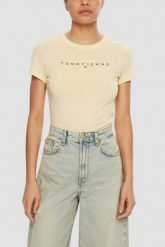TOMMY JEANS Żółty t-shirt damski. Żółte t-shirty damskie Tommy Jeans, s, bez wzorów, z jeansu, bez kołnierzyka, bez ramiączek. W wyprzedaży za 125.99 zł.